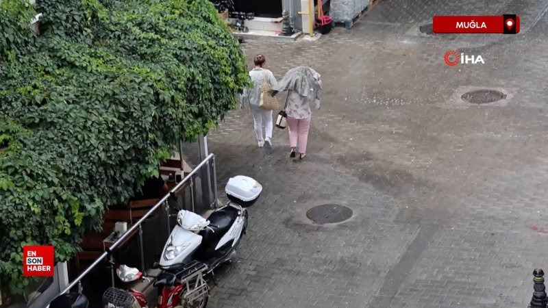 Muğla’da güneşli havada yağmur sürprizi